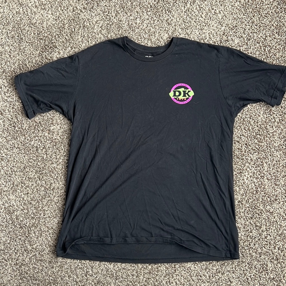 Dakine Hawaii t shirt. 2 very small holes